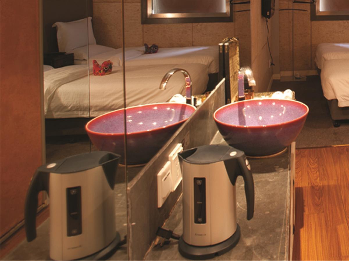 China Community Art Habitat Hotel Qingdao Rom bilde